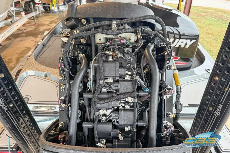 Slide: The Image of 2016 Nitro Z21 Pro boat engine with exposed components and wiring. - 34
