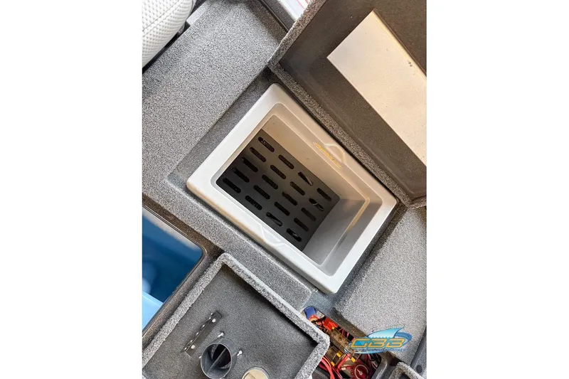 Slide: The Image of 2016 Nitro Z21 Pro boat storage compartment with organized interior layout. - 44