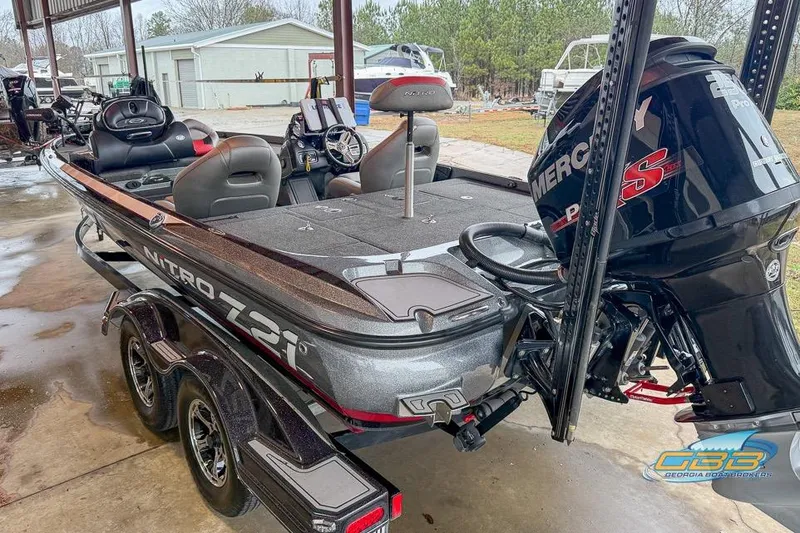 Slide: The Image of 2016 Nitro Z21 Pro fishing boat with Mercury engine, parked under a shelter. - 47