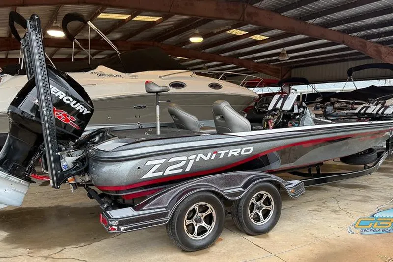 Slide: The Image of 2016 Nitro Z21 Pro boat with Mercury engine in a showroom. - 49