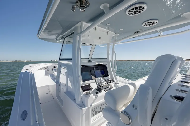 Slide: The Image of 2027 Onslow Bay 37 Tournament Edition boat interior with advanced navigation system on open water. - 4
