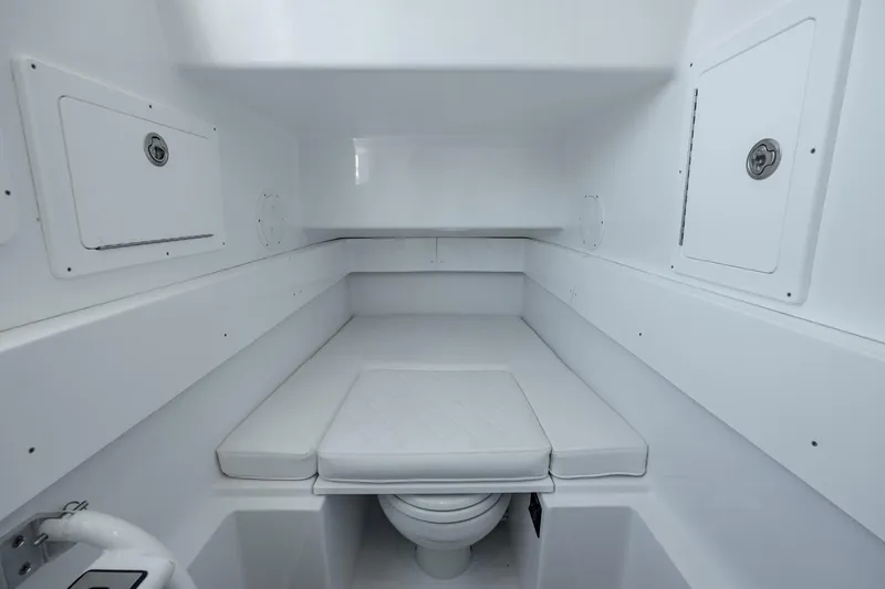 Slide: The Image of 2027 Onslow Bay 37 Tournament Edition boat cabin interior with storage compartments. - 9