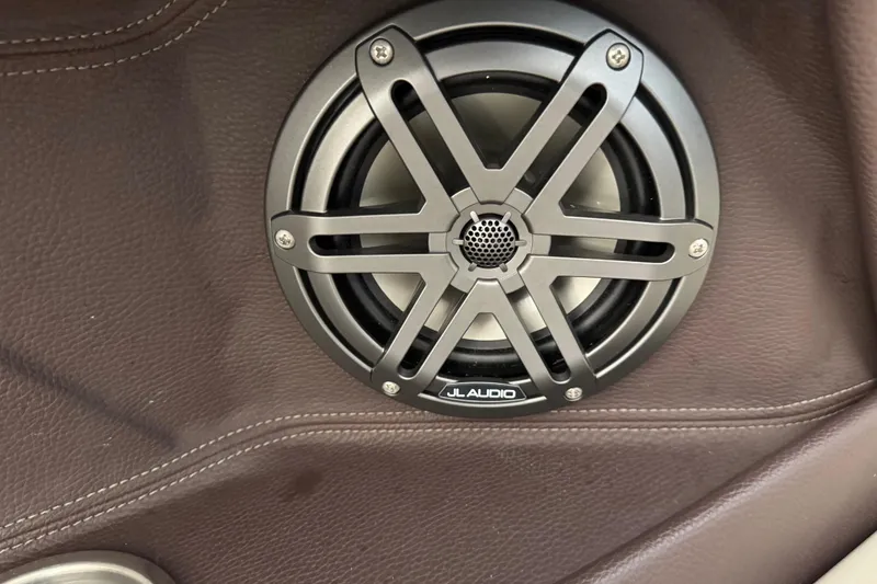 Slide: The Image of JL Audio speaker in 2014 Regal 28 Express boat interior. - 11