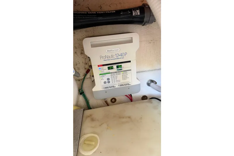 Slide: The Image of ProNautic 12-40P charger in 2014 Regal 28 Express boat. - 34