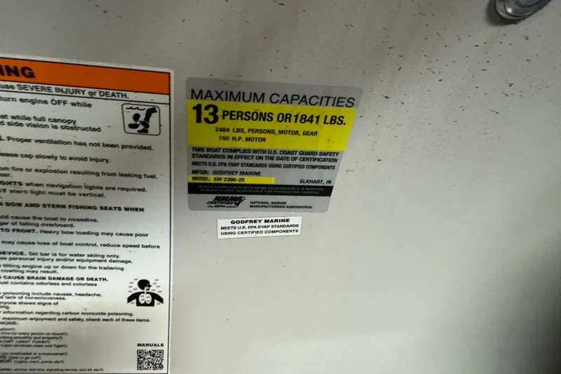 Slide: The Image of Capacity label for 2021 Godfrey Sweetwater 2386 FS, max 13 persons or 1841 lbs. - 13
