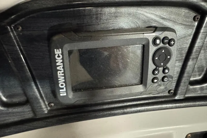 Slide: The Image of Lowrance fish finder on 2021 Godfrey Sweetwater 2386 FS boat dashboard. - 14