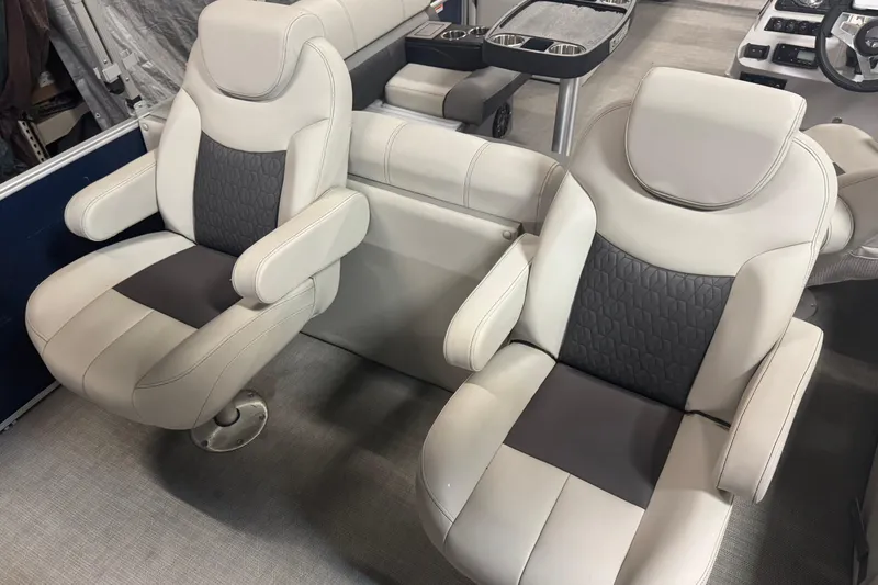 Slide: The Image of 2021 Godfrey Sweetwater 2386 FS boat seats, featuring plush gray and black upholstery. - 19