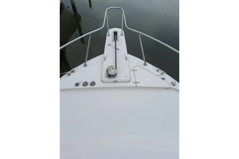 Slide: The Image of Bow view of 2013 Grady-White Express 330 boat with anchor chain. - 15