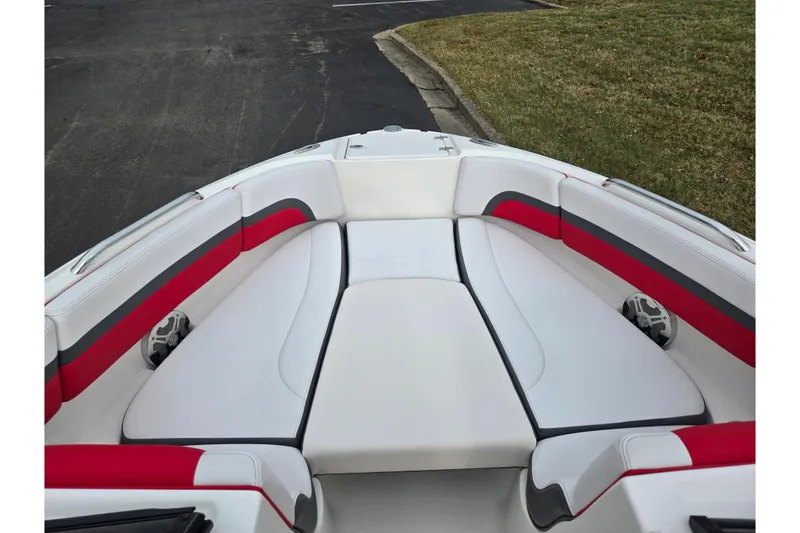 Slide: The Image of 2015 Chaparral Vortex 223 VRX boat interior with red and gray accents. - 21