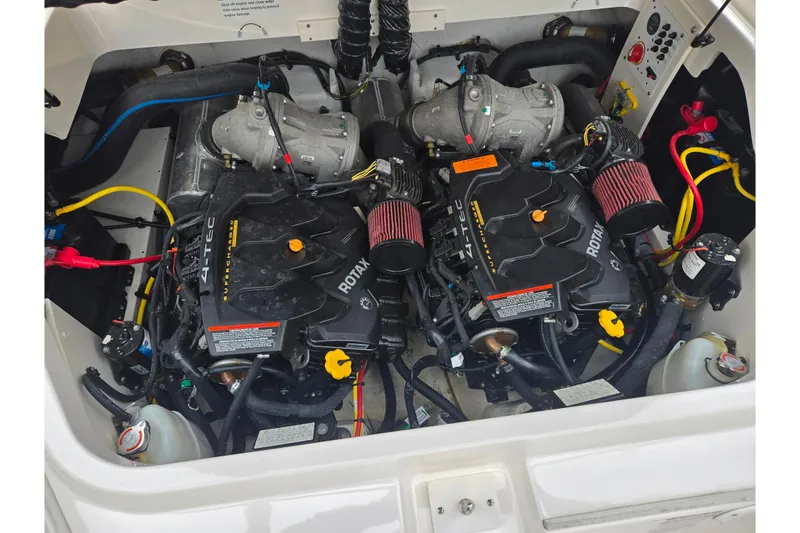Slide: The Image of Engine compartment of 2015 Chaparral Vortex 223 VRX with dual Rotax engines. - 26