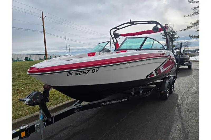 Slide: The Image of 2015 Chaparral Vortex 223 VRX boat on trailer, red and white design. - 5