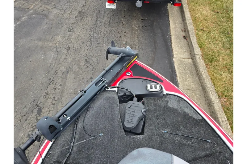 Slide: The Image of 2015 Nitro Z-7 boat with trolling motor on a paved road. - 17