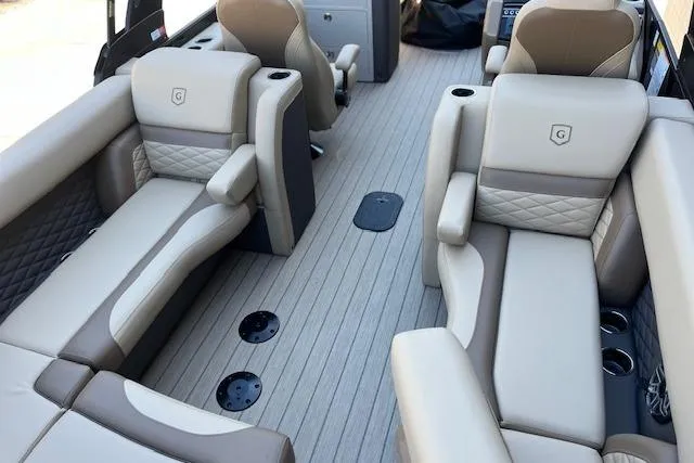 Slide: The Image of 2026 Godfrey Monaco 255 SFLC interior with luxurious beige seating and modern design. - 10