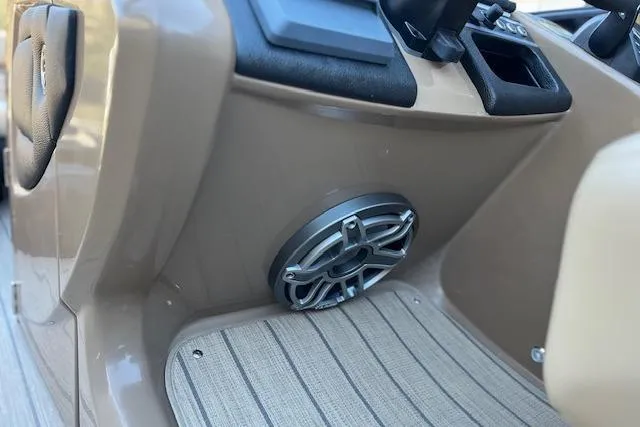 Slide: The Image of 2026 Godfrey Monaco 255 SFLC boat interior with speaker and control panel. - 15