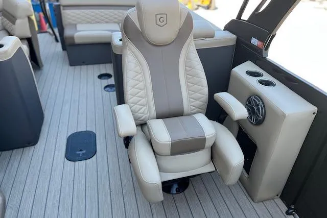 Slide: The Image of 2026 Godfrey Monaco 255 SFLC boat interior with luxurious captain's chair and modern design. - 21