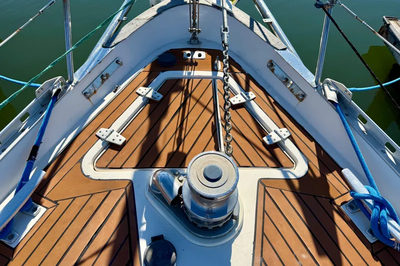 Slide: The Image of Deck of 1986 Nauticat 43 sailboat with anchor chain and FlexiTeak composite decking - 14