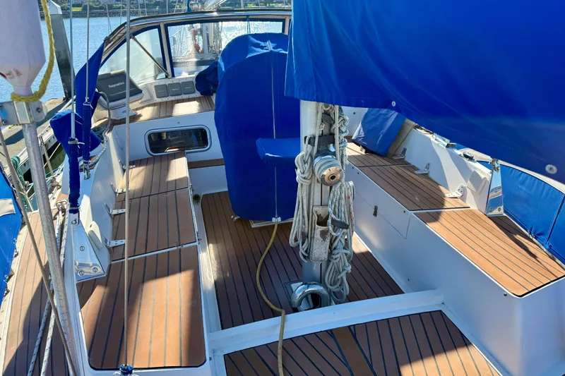 Slide: The Image of 1986 Nauticat 43 sailboat cockpit with blue covers and FlexiTeak composite decking - 4