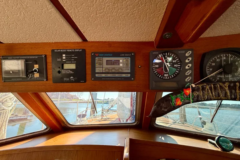 Slide: The Image of Control panel of a 1986 Nauticat 43 sailboat with navigation instruments. - 51