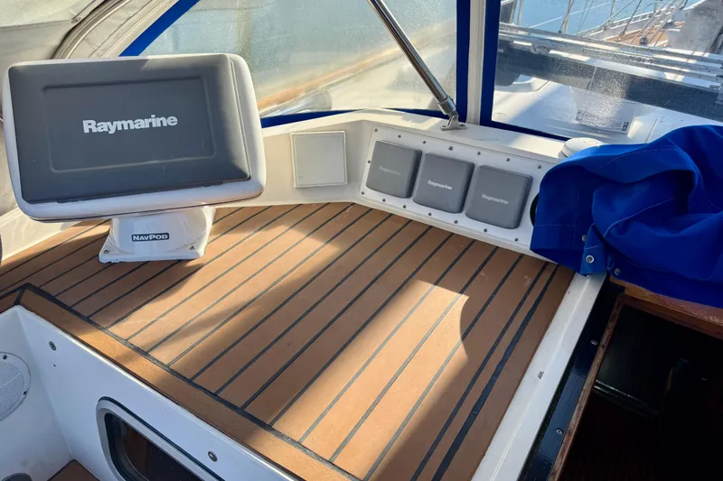 Slide: The Image of Cockpit of 1986 Nauticat 43 with Raymarine navigation equipment and FlexiTeak composite decking. - 7