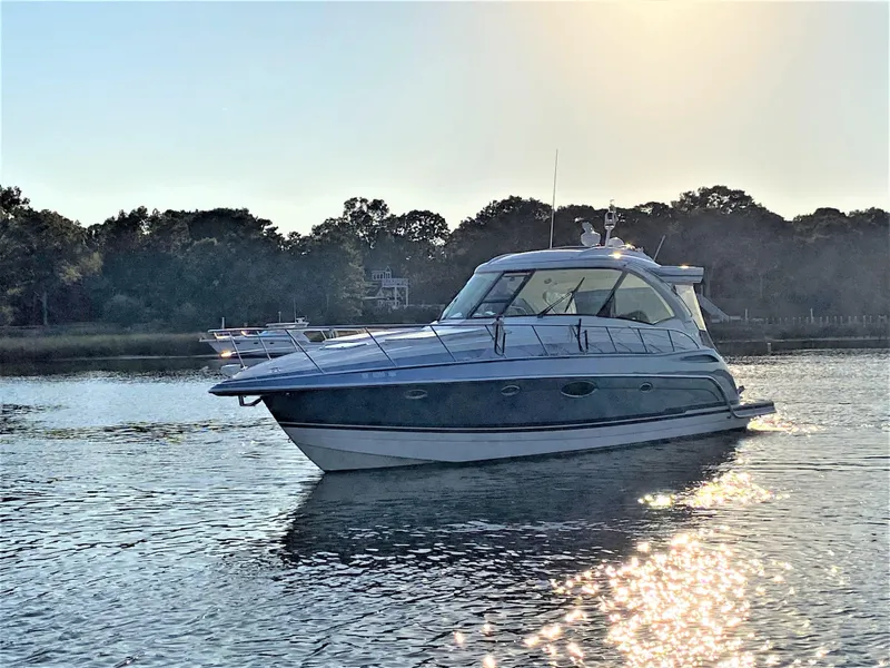 Slide: The Image of 2018 Formula 45 Yacht on calm water at sunset. - 2