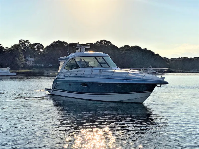 Slide: The Image of 2018 Formula 45 Yacht on calm water at sunset. - 4