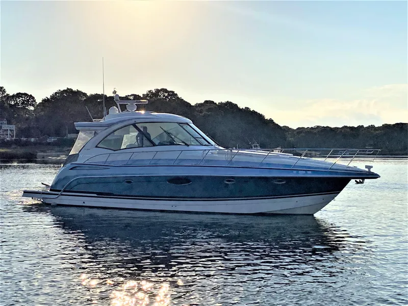 Slide: The Image of 2018 Formula 45 Yacht on calm water at sunset. - 5