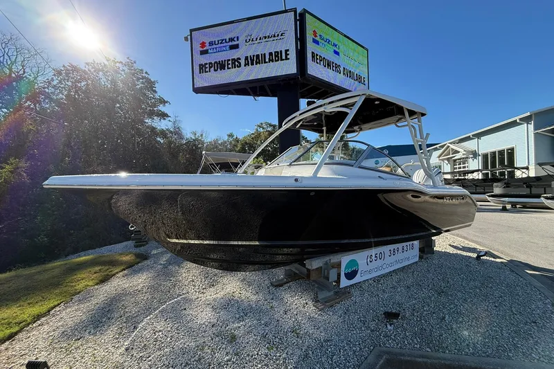 The Image of 2026 Key West 239 DFS boat displayed outdoors at Emerald Coast Marine dealership. - 0