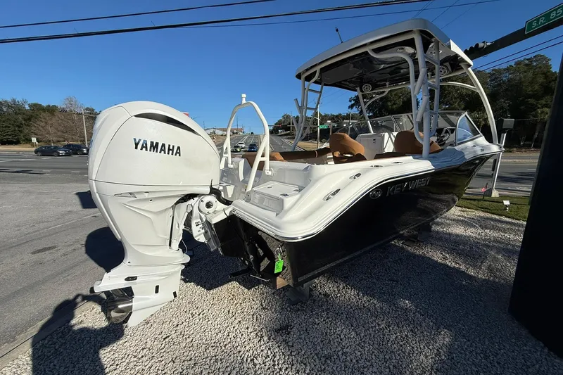 Slide: The Image of 2026 Key West 239 DFS boat with Yamaha engine displayed outdoors. - 3
