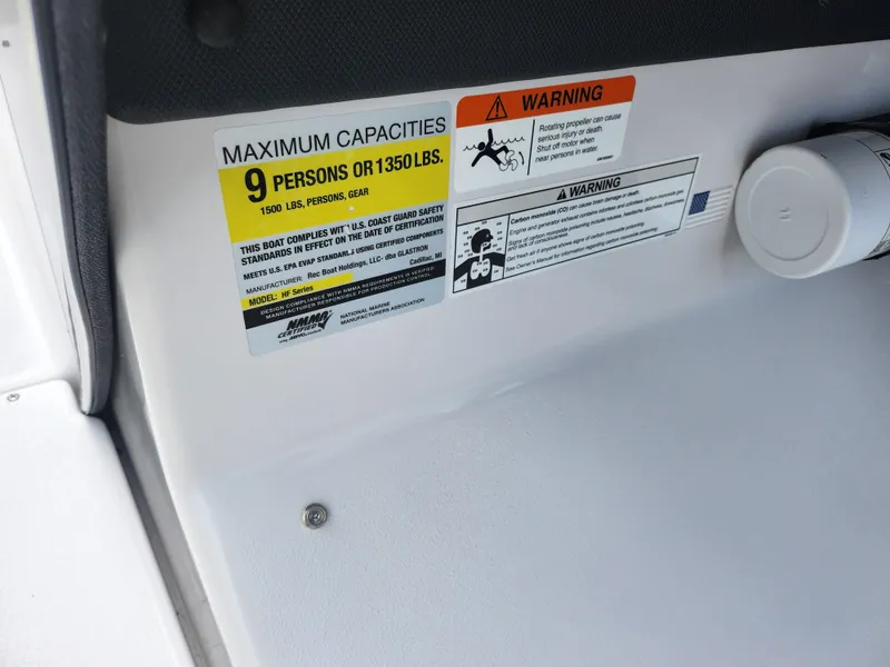 Slide: The Image of Capacity warning label on 2016 Glastron GT 205 boat, maximum 9 persons or 1350 lbs. - 16
