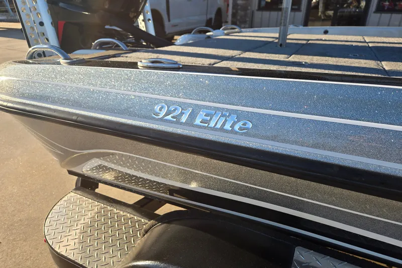 Slide: The Image of 2020 Phoenix 921 Elite boat with metallic finish, close-up view. - 10