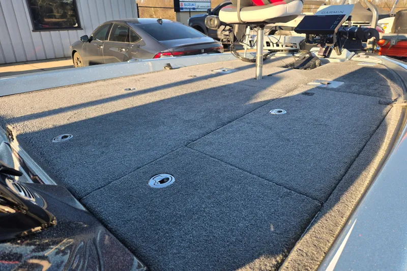 Slide: The Image of 2020 Phoenix 921 Elite boat deck with carpeted surface and fishing seat. - 15