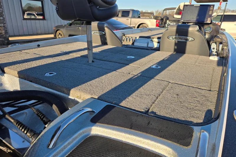 Slide: The Image of 2020 Phoenix 921 Elite boat deck with seating and control panel in sunlight. - 17