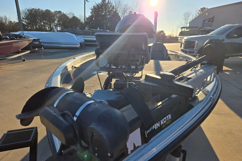 Slide: The Image of 2020 Phoenix 921 Elite boat with Garmin and Minn Kota Ultrex equipment in a sunny outdoor setting. - 25
