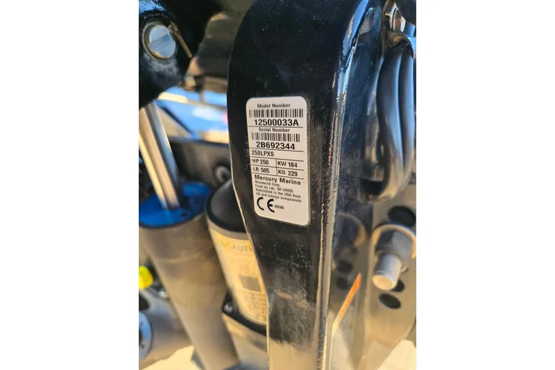 Slide: The Image of Label on Phoenix 921 Elite 2020 boat component, showing model and serial numbers. - 28