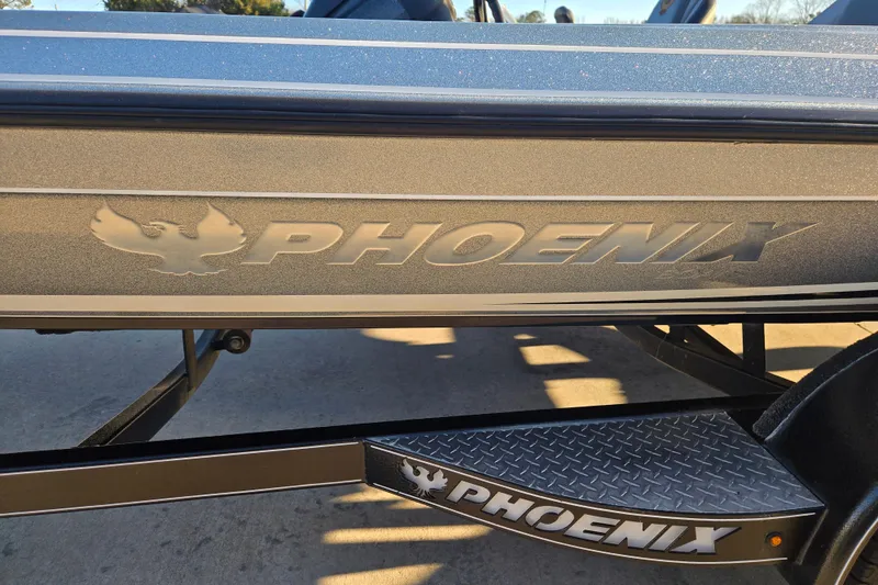 Slide: The Image of 2020 Phoenix 921 Elite boat with logo and metallic finish. - 3