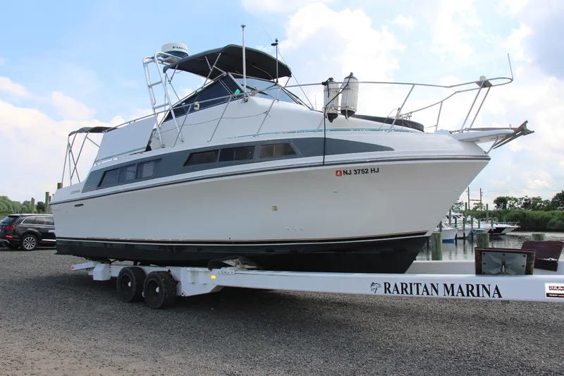 Slide: The Image of 1995 Carver 330 Mariner yacht on trailer at Raritan Marina, ready for launch. - 10