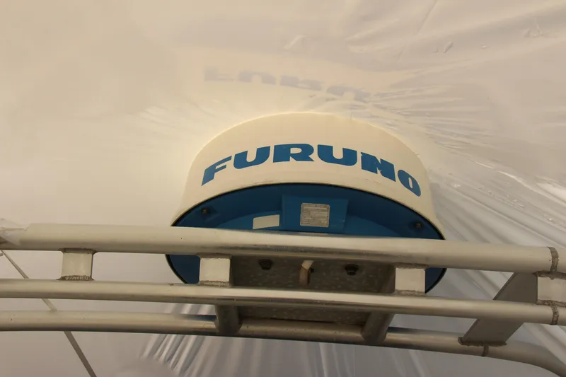 Slide: The Image of Radar equipment on 1995 Carver 330 Mariner, featuring Furuno branding. - 16