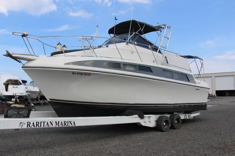 Slide: The Image of 1995 Carver 330 Mariner yacht on trailer at Raritan Marina. - 7