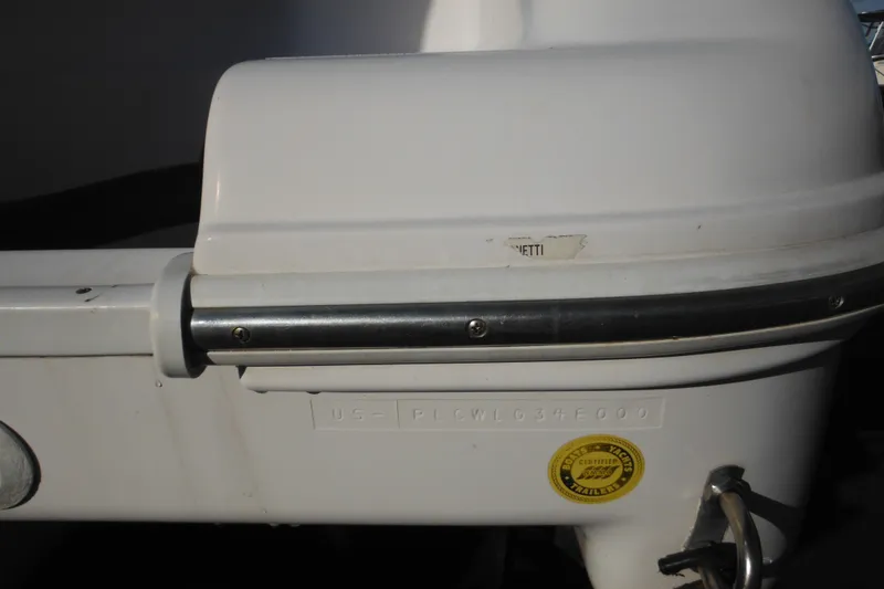 Slide: The Image of 2000 Pro-Line 23 Walkaround boat hull with certification sticker and serial number. - 5