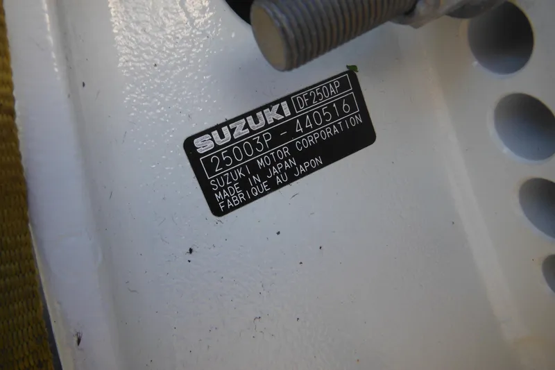 Slide: The Image of Label on Suzuki motor, model DF250AP, made in Japan, on Pro-Line 23 Walkaround boat. - 6