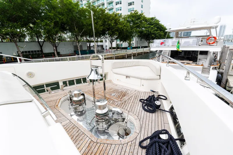 Slide: The Image of Luxurious 2018 Custom Line Navetta 33 yacht deck with seating and mooring equipment. - 10