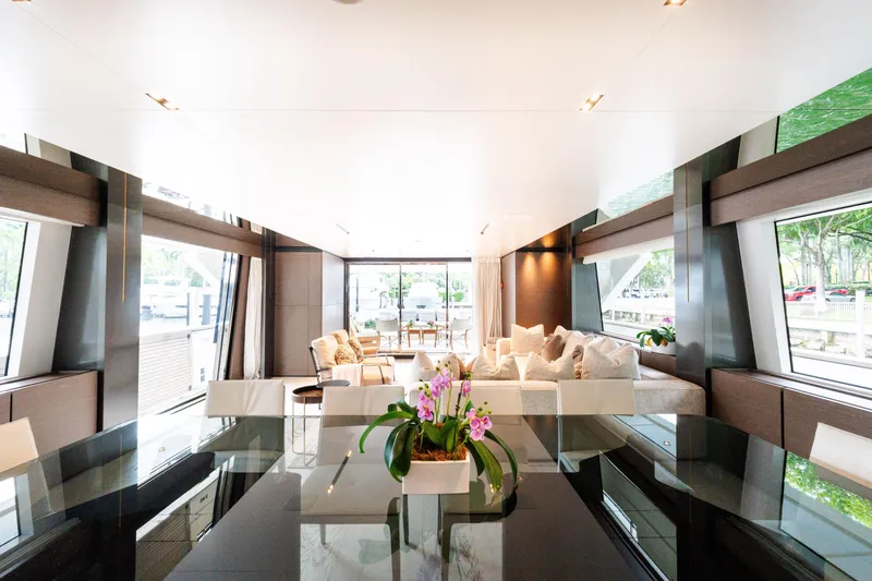 Slide: The Image of Luxurious interior of 2018 Custom Line Navetta 33 yacht with elegant seating and floral decor. - 17
