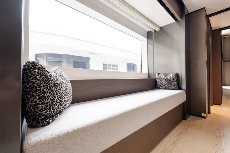 Slide: The Image of Luxurious interior of 2018 Custom Line Navetta 33 yacht with elegant seating and leopard print cushions. - 21
