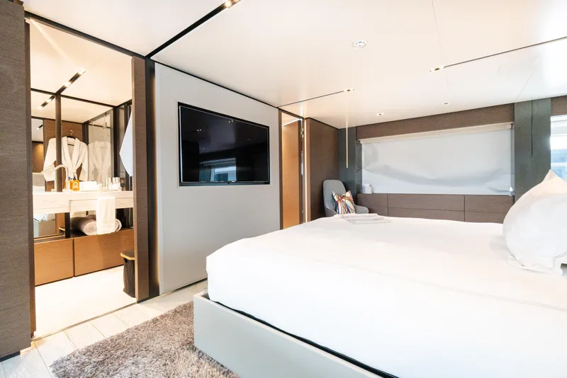 Slide: The Image of Luxurious bedroom interior on 2018 Custom Line Navetta 33 yacht, featuring modern design and amenities. - 24