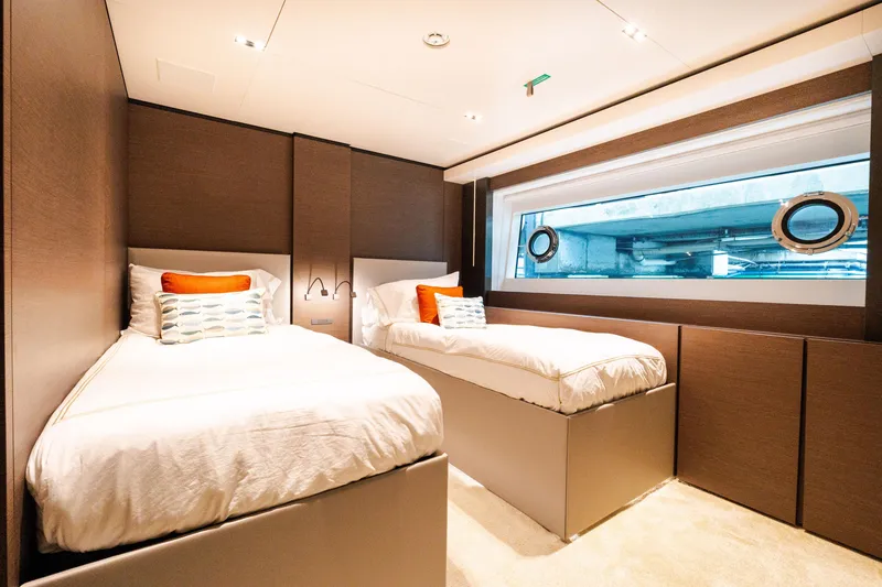 Slide: The Image of Luxurious twin bedroom on 2018 Custom Line Navetta 33 yacht with modern decor. - 37