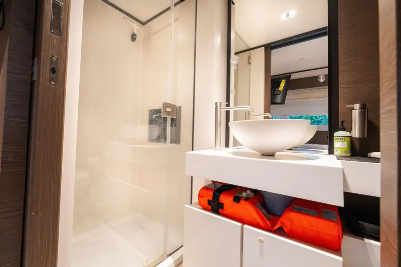 Slide: The Image of Luxurious bathroom on 2018 Custom Line Navetta 33 yacht with modern fixtures and shower. - 43