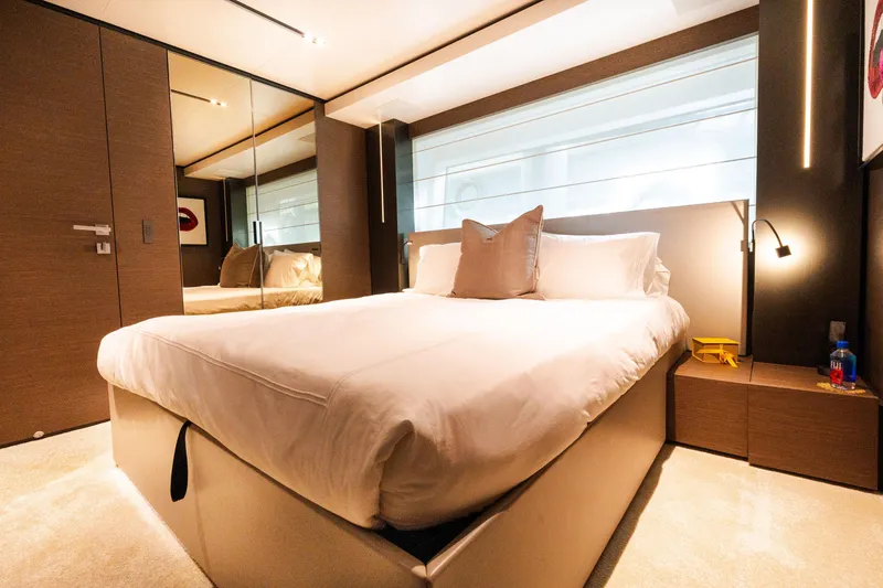 Slide: The Image of Luxurious bedroom interior on 2018 Custom Line Navetta 33 yacht, featuring modern design and cozy ambiance. - 44