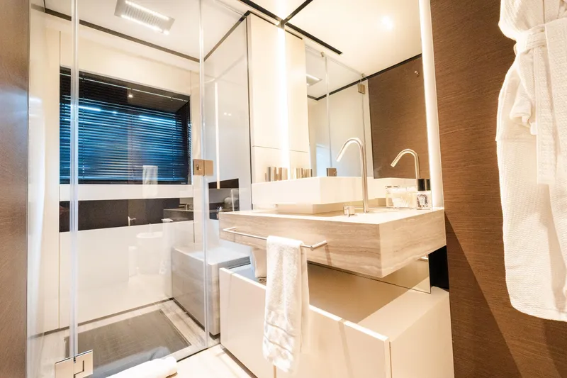 Slide: The Image of Luxurious bathroom in 2018 Custom Line Navetta 33 yacht, featuring modern fixtures and elegant design. - 46