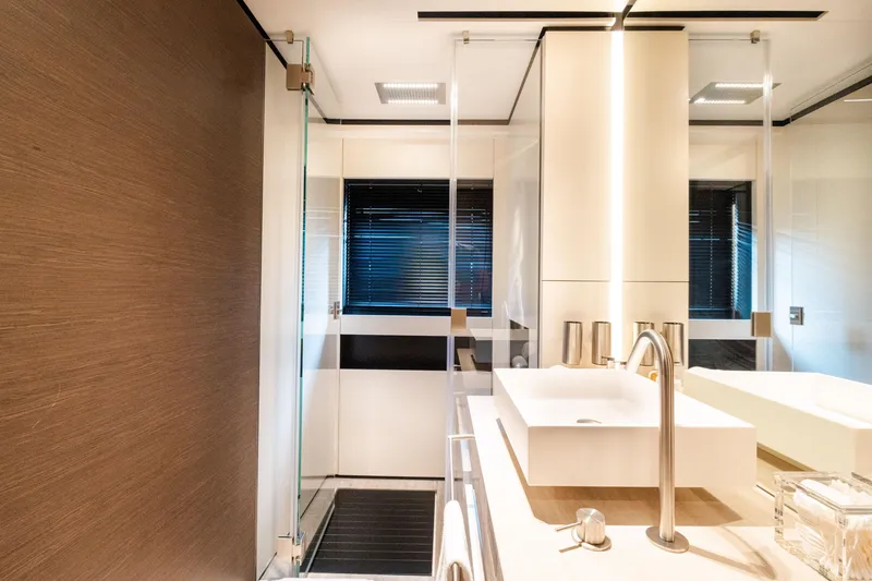 Slide: The Image of Luxurious bathroom interior on 2018 Custom Line Navetta 33 yacht, featuring modern fixtures and elegant design. - 47