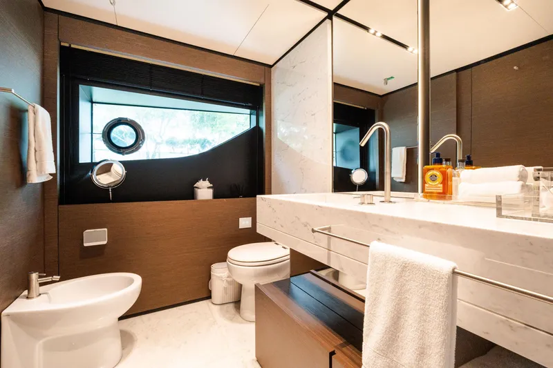 Slide: The Image of Luxurious bathroom in 2018 Custom Line Navetta 33 yacht with modern fixtures and elegant design. - 48